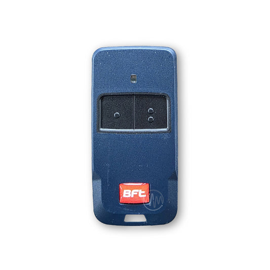 Rounded thin dark blue rectangle BFT branded remote with black rubber button pad divided into 2 with red & white BFT logo on the bottom front