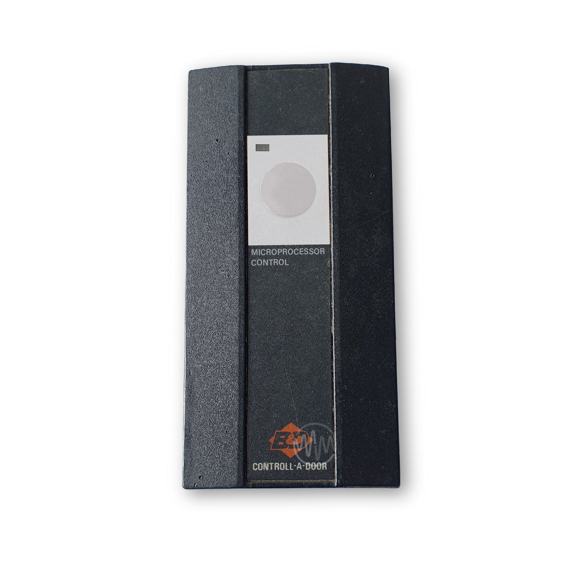 Large old black B&D Controll-A-Door brand black remote with single round white button