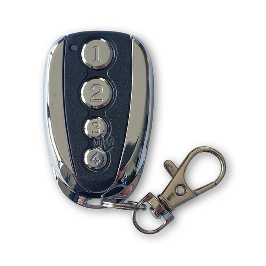 Doorworks chrome & black garage door remote with 4 silver round numbered buttons in a row down the centre