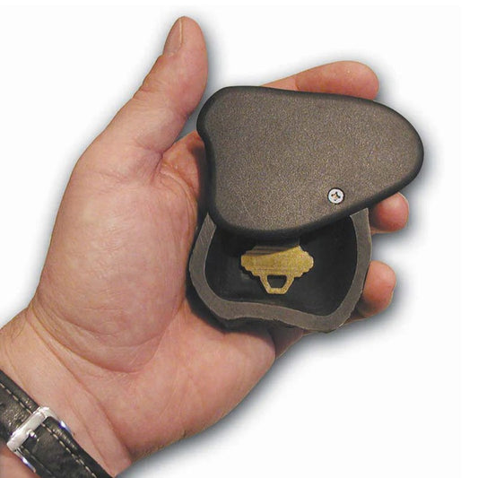 Bottom of Lucky Line faux rock key hider showing hidden compartment with key inside