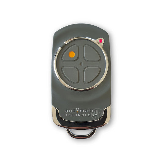 Automatic Technology branded grey garage & gate remote with chrome accents & grey button pad segmented into 4 buttons