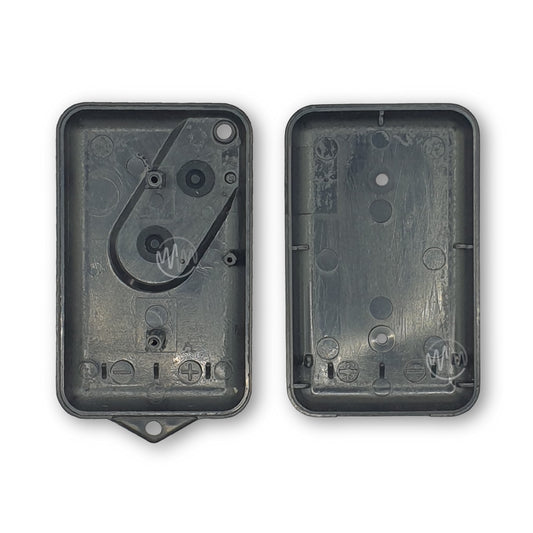 A black replacement outer shell casing for a Steel-Line garage door remote.