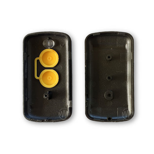 A black 2-button remote replacement shell casing with yellow buttons, internal front and back view.