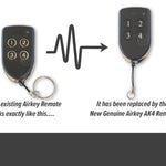 Black & silver shield shaped airkey remotes with 4 round numbered buttons