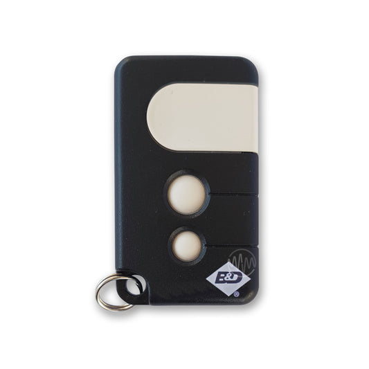 Black B&D 4335A key ring style garage door remote with 1 large button & 2 small circular white buttons 