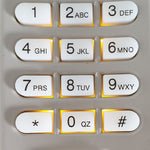 Close up of Chamberlain beige E840C keypad's yellow backlit button pad