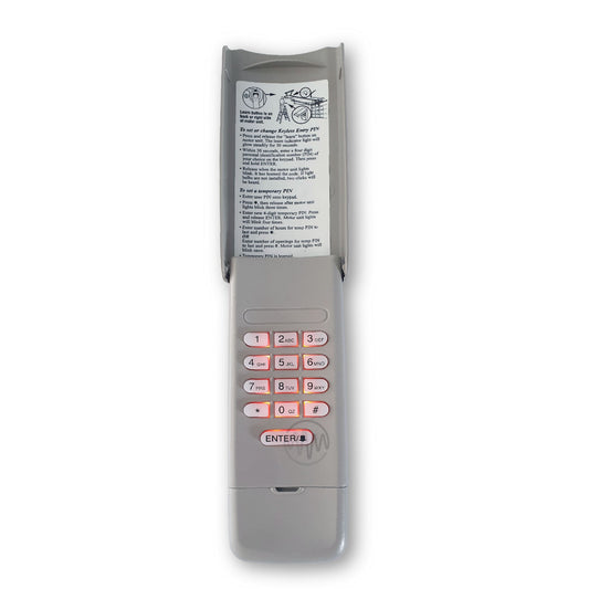 Chamberlain beige 8747AML C840 keypad for garages & gates open showing orange backlit button pad