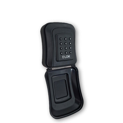 Weather cover open on Front of E-Lok brand black metal lock box with numbered round push buttons