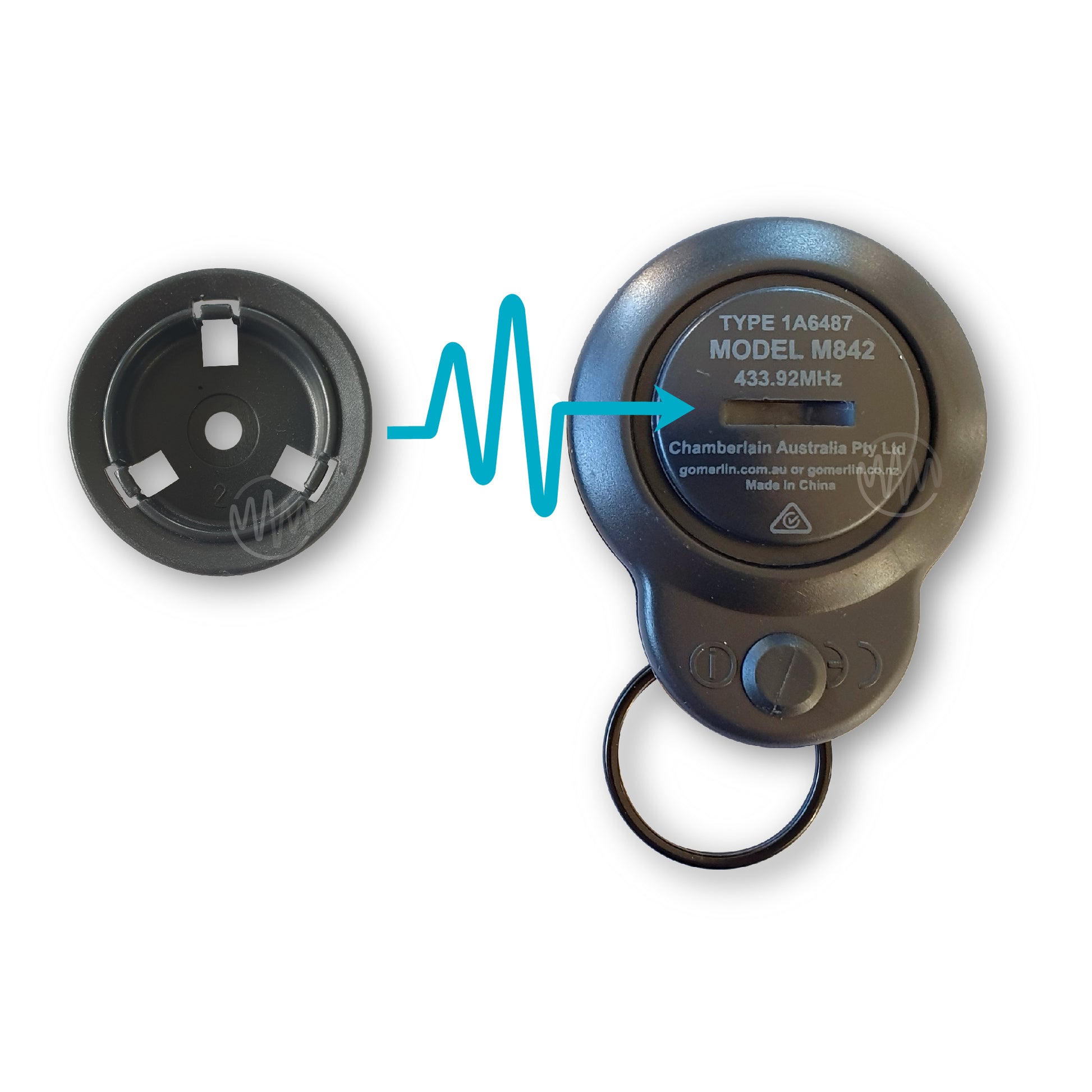 Merlin M842 model garage remote control with wall bracket attachment removed & pictured alongside