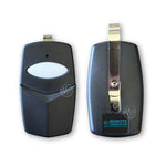 Front & Back view of large black garage remote with metal sun visor attachment & large white oval button