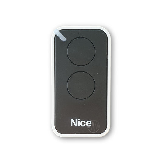 Nice branded black & white small rounded oblong shaped gate remote with 2 round buttons 