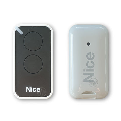 Nice branded black & white small rounded oblong shaped gate remote with 2 round buttons front & back view