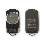 Front & back of Automatic Technology branded black garage & gate remote with chrome accents & grey button pad segmented into 4 buttons