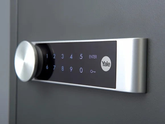 Yale electronic door lock on a black door