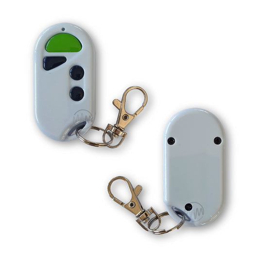 White ACDC green button remote front & back view