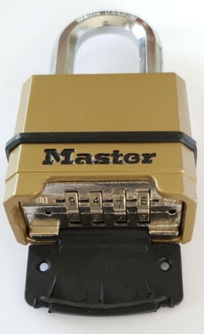 Master Lock brass padlock with combination dial at base